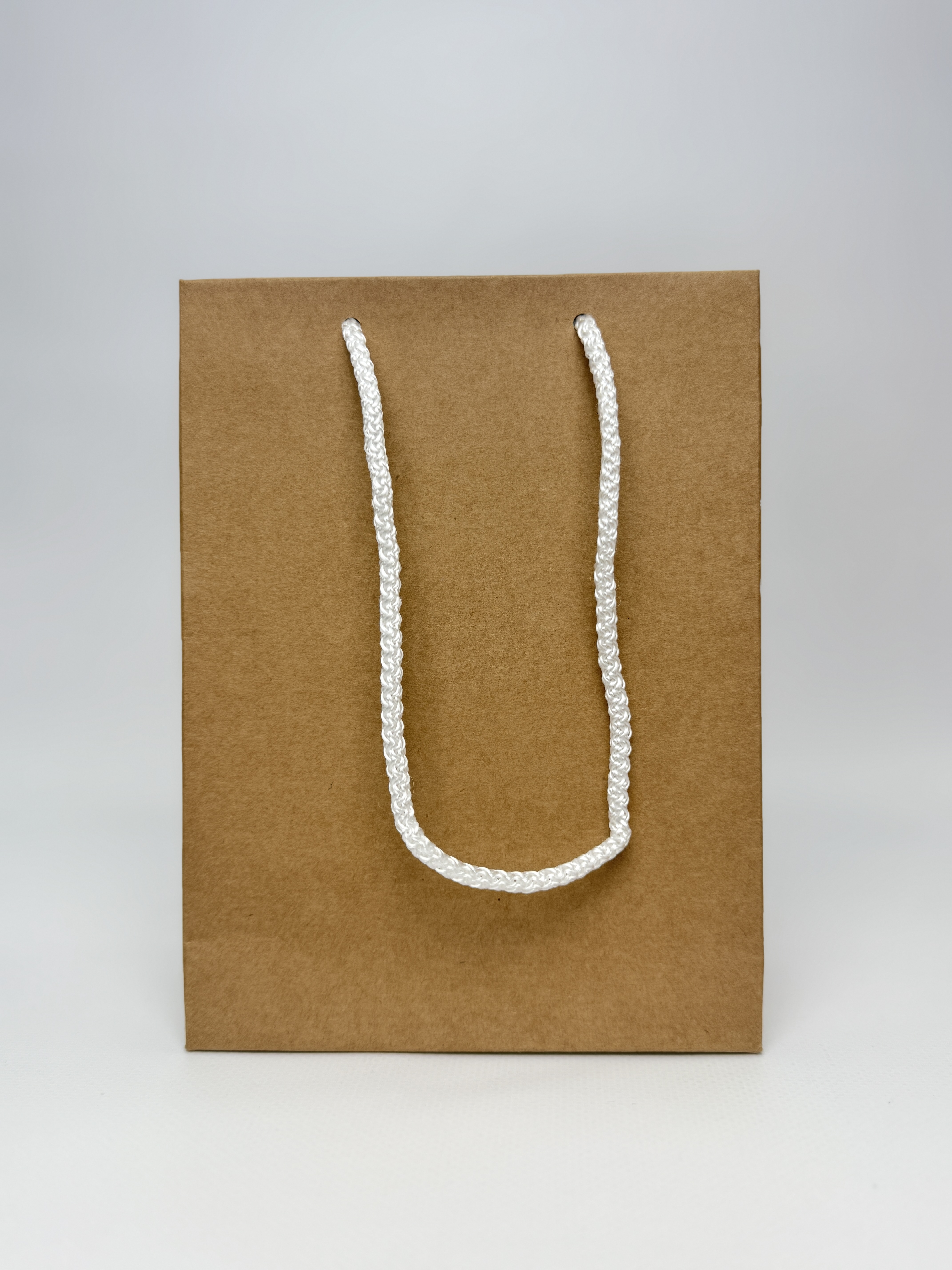 Пакет подарунковий крафт без малюнку 15х20х8 см бурий